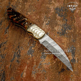 Intricately designed Folding damascus knife, decorative Jewellery grade scalloped brass bolsters, file worked brass spacers, Exotic ram horn handle. UK Knife store, UK Knife seller, UK Knife shop