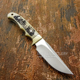 The Wild Kingdom is a compact handcrafted hunting knife that captures the spirit of untamed wilderness through detailed engraving and practical design.