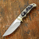 Built with a durable D2 tool steel blade and a finely engraved camel bone handle, this knife combines reliable field performance with artistic wildlife imagery.