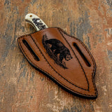 rendered in bold line work that emphasizes the animal’s powerful form and textured fur.