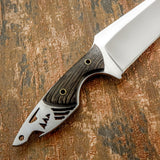 The handle features finely contoured wenge wood scales mounted on a sculpted Skeletal full tang frame.