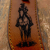 The engraving uses bold, dark linework to emphasize the rider’s posture and the horse’s motion, giving the scene a classic western illustration style.