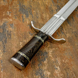 The deep coloration contrasts beautifully with the polished stainless steel guard and pommel, creating a strong visual balance between metal and wood. Decorative