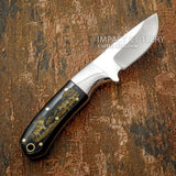 Its durable D2 tool steel blade is paired with a beautifully engraved bull horn handle and a custom leather sheath featuring wildlife artwork