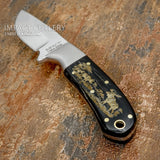 Brass pins and a lanyard tube reinforce the handle construction while adding visual balance to the design.