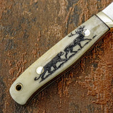 The deeply engraved artwork depicts a leopard follows rocky terrain behind a stag with prominent antlers. 