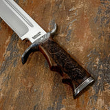 Hand Forged Damascus guard and pommel provide strength while complementing the natural grain of the wood. The detailed engraved dragon artwork transforms the handle into a striking centrepiece, making every angle worthy of display.