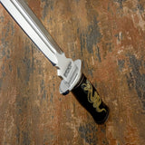 Polished stainless steel guard and pommel fittings frame the handle, adding structural strength and a clean metallic contrast against the dark horn.
