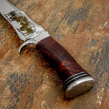 The handle is crafted from high-polish resin with deep reddish tones and natural swirling patterns that give the handle a unique marbled appearance