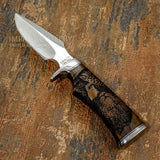 beautifully detailed hunting knife that merges functional design with wildlife artistry