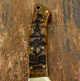 Buy UK Knife with Wooden handle with ship engraving on a textured brown background