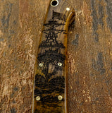 UK knife store offering This drop point knife Wooden handle with U.S Navy ship engraving 