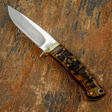 UK Impact Cutlery Knife with wooden handle on a textured brown surface, Maritime Ship Engraving