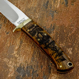 Wooden handle with Maritime ship engraving on a textured brown background, UK Knife store