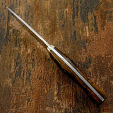 The drop point blade profile offers excellent control and versatility for detailed cutting tasks while maintaining a strong, durable tip. 