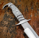 The handle is shaped for a comfortable, secure grip and incorporates contrasting dark spacer lines that frame the gemstone sections. 