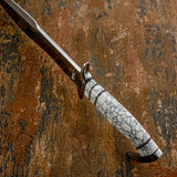 Spine view of the White Canyon Gem Stone Bowie