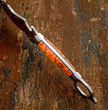 A close-up of spine view of the Model # 8058 – "Sunstone" Skinning Guthook Knife