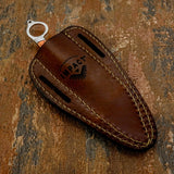 Supplied with the handmade brown leather sheath shown in the photographs. The sheath features contrasting stitching and dual elongated belt slots for convenient carry