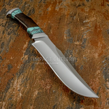 A fixed-blade hunting knife with a polished steel blade and a dark wood handle featuring turquoise gemstone inlay. Buy from UK Knife Store