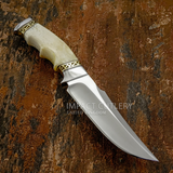 The Sandstone handcrafted hunting knife from UK knife maker, combining a broad satin-finished D2 Tool Steel blade with a beautifully sculpted camel bone handle. Intricately fitted Fileworked Brass Spacers