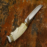 UK knife with a polished silver steel blade and a textured ivory bone handle, decorated with gold geometric accents, Slim ergonomic contoured handle with finger notches