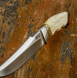 Top swedge view of the Sandstone Knife, ivory tone bone handle, thick brass decorative spacers.