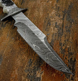 This custom handmade Damascus steel hunting knife is a bold statement piece that blends traditional forging techniques with artistic detail. 