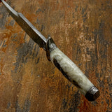  nautical-themed collector’s knife inspired by classic maritime artwork, blending traditional forging with detailed storytelling