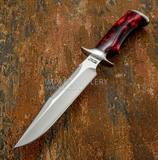 A fixed-blade knife with a satin-finished silver blade and a red marbled Resin handle, Sawtooth Profile, Sharpened top Swedge. UK knife dealer