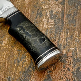 The polished pins and lanyard hole provide secure construction while complementing the organic tones of the bull horn.