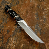 A fixed-blade knife with a Satin polished silver D2 blade and a black Bull Horn handle featuring file worked Brass accents, Buy from UK knife maker
