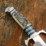 Handle Closeup of Canyon Scroll Bowie Knife, Camel Bone Handle with Intricate Engraving, Gemstone handle, Steel Guard and But Cap
