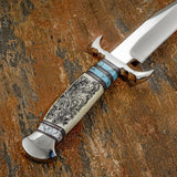 Handle Closeup of Canyon Scroll Bowie Knife, Camel Bone Handle with Intricate Engraving, Gemstone handle, Steel Guard and But Cap