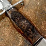 The deep engraving stands out beautifully against the warm wood grain, creating a dramatic and highly detailed centerpiece.
