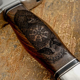 The handle is crafted from richly toned rosewood and deeply engraved with intricate Norse artwork. Buy UK Dagger