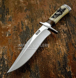 This striking handcrafted hunting knife pairs a powerful satin-finished D2 tool steel blade with a beautifully engraved camel bone handle and matching engraved leather sheath. 