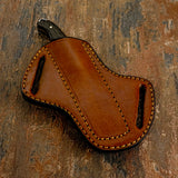Handcrafted brown leather sheath
• Reinforced stitching for durability
• Dual belt slots for secure belt carry
