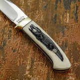 Fine etched lines define the scale pattern and natural contours of the animal, giving the artwork depth and realism.