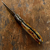 Forked-tongue knife with decorative handle