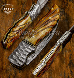 Crafted by Impact Cutlery United Kingdom, this exquisite custom folder showcases sculpted bone scales,