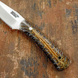 The handle is crafted from pinecone resin, featuring a captivating blend of natural pinecone structure suspended within translucent resin.